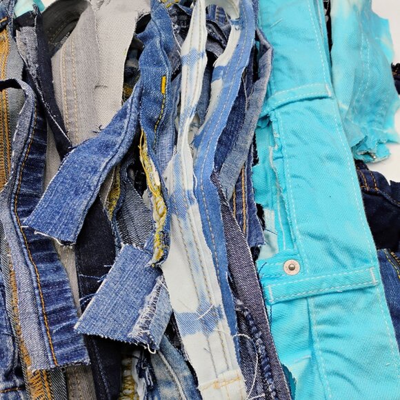 71 pieces of denim fabric scraps to include hems, seams, waistbands and zippers. - Picture 3 of 3